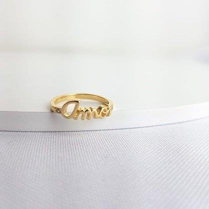 ANEL ESCRITO AMOR COM 1 ZIRCONIA DE CADA LADO ECOM