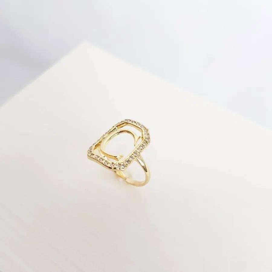 ANEL 1,6CM RETANGULAR CRAV/VAZADA COM LETRA H LISA