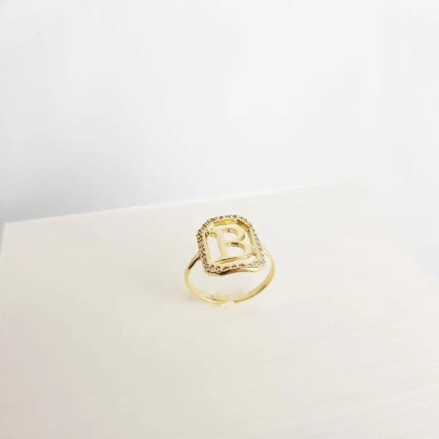 ANEL 1,6CM RETANGULAR CRAV/VAZADA COM LETRA R LISA