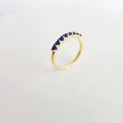 ANEL MEIA ALIANCA COM 8 ZIRCONIAS AZUL 3MM ECOMM