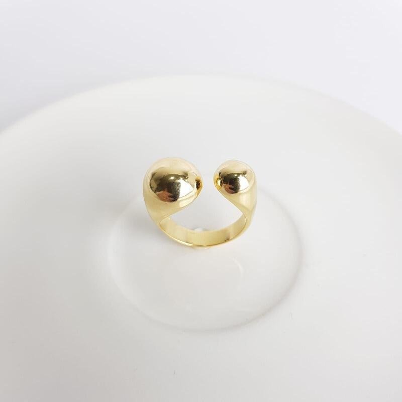 ANEL ABERTO FRENTE EM 2 ESFERAS LISAS