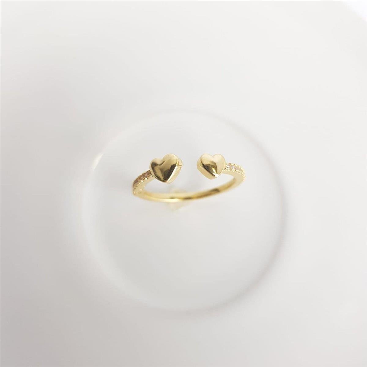 ANEL ABERTO ARO CRAVEJADO PONTO 2 CORACOES LISO| BANHADO EM OURO 18K