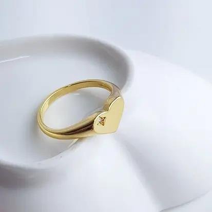 ANEL CORACAO 1CM LISO 1 ZIRC CRAV ESTRELA| BANHADO EM OURO 18K