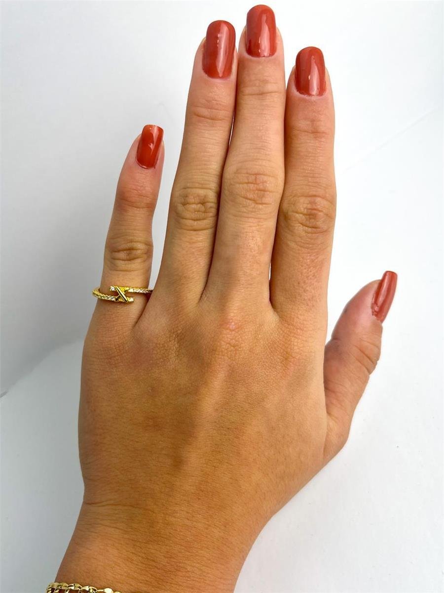 ANEL ARO ENTRELACADO CRAVEJADO X AO MEIO | BANHADO EM OURO 18K