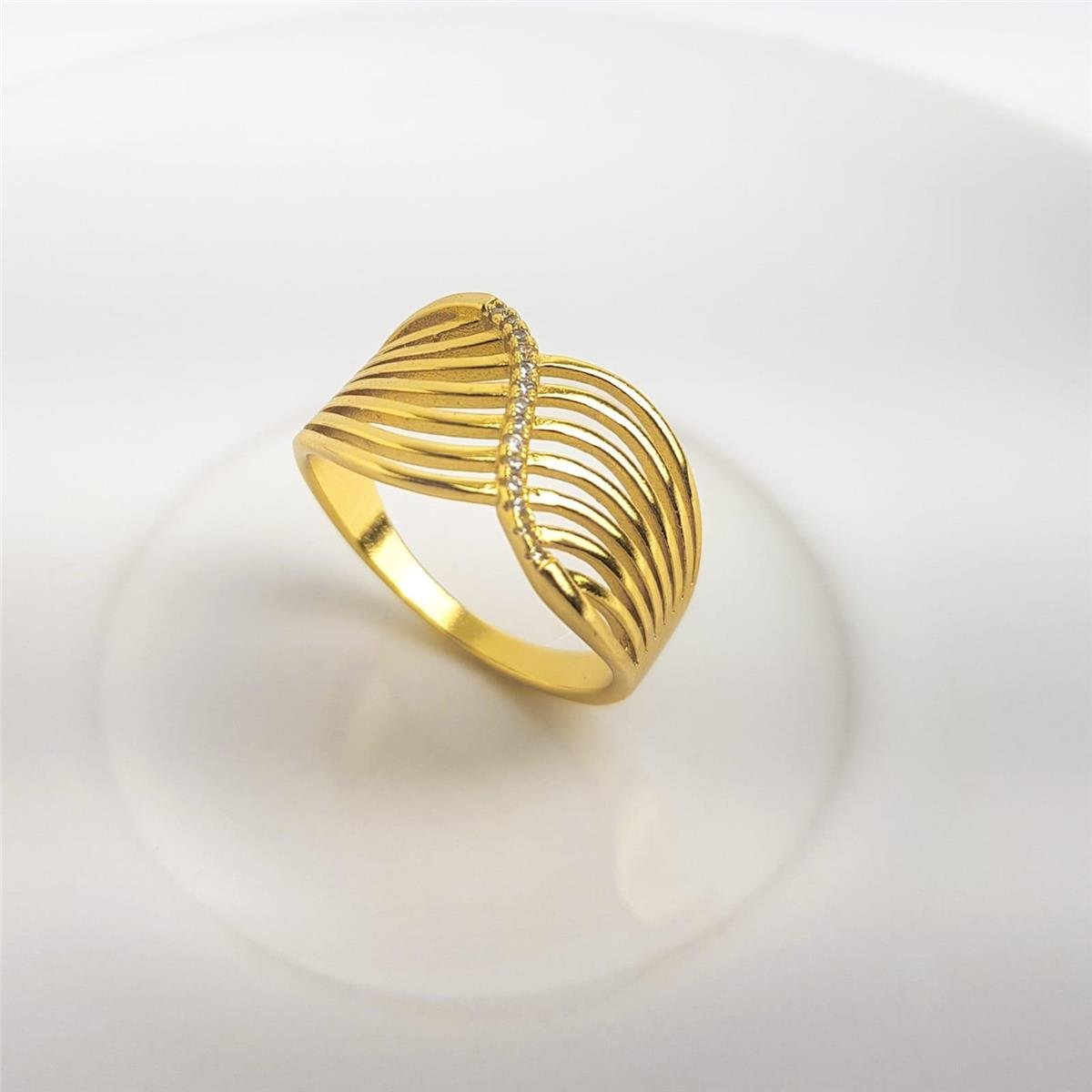 ANEL EM 7 FILETES LISOS ENTRELAÇADO FILETE CRAVEJADO AO MEIO | BANHO DE OURO 18K