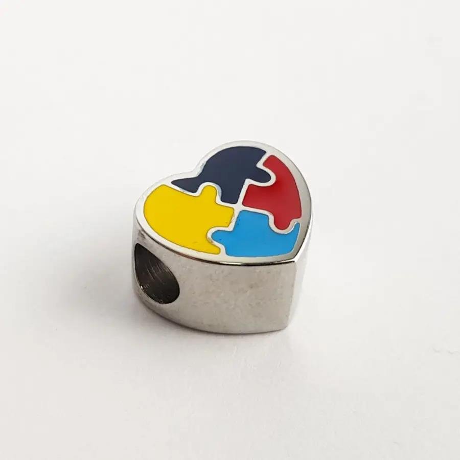 BERLOQUE CORACAO PASSADOR SIMBOLO AUTISMO ACO INOX