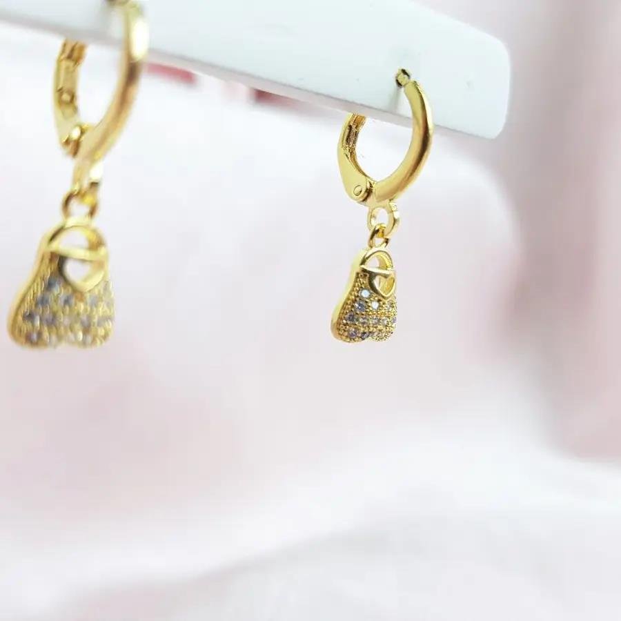 BRINCO ARGOLA CLICK BOLSINHA CRAV|2CM|BANHADO EM OURO 18K