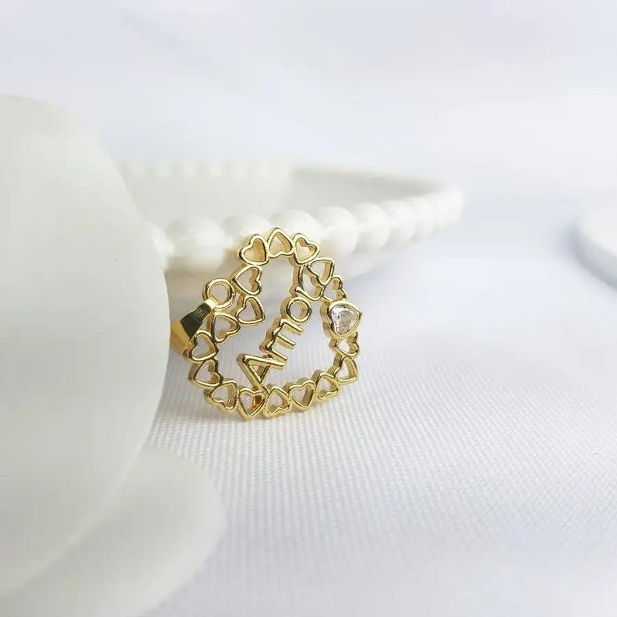 PINGENTE CORACOES VAZADOS ESCRITO AMOR|BANHADO EM OURO 18K