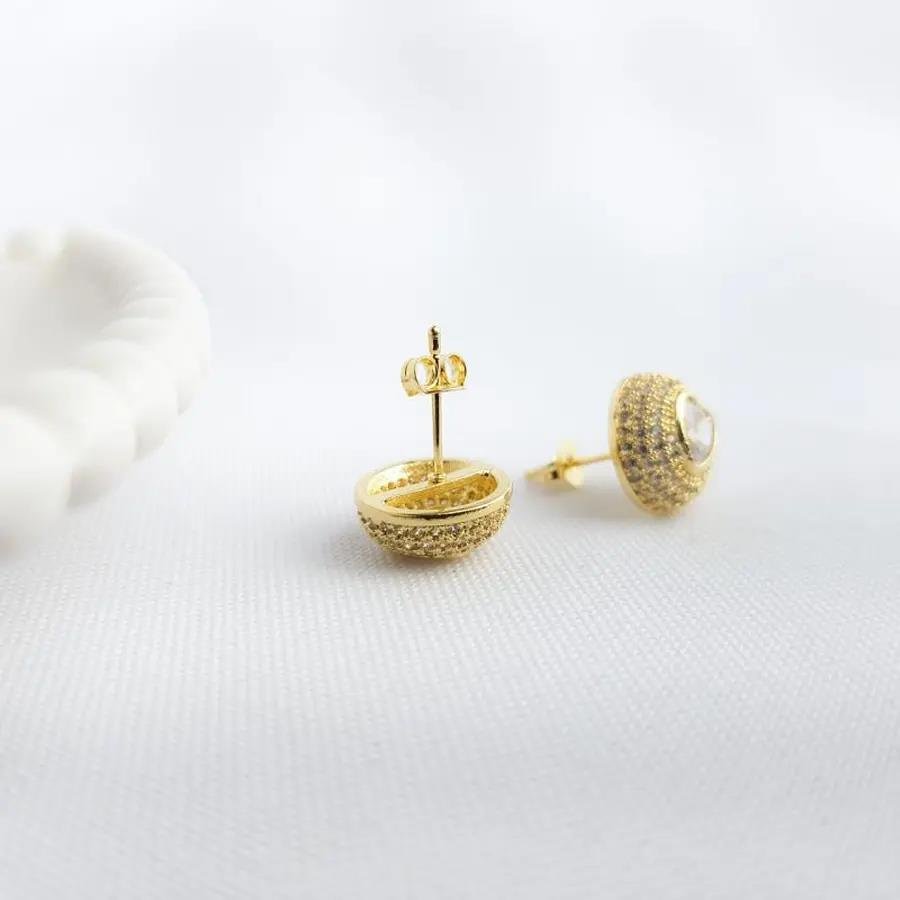 BRINCO REDONDO CRAV COM CORACAO ZIRCONIA MEIO